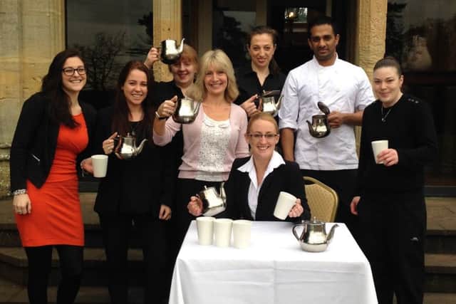 Vicky Marshall and her colleagues at Shendish Manor who are all backing her Tea Challenge PNL-160802-095517001