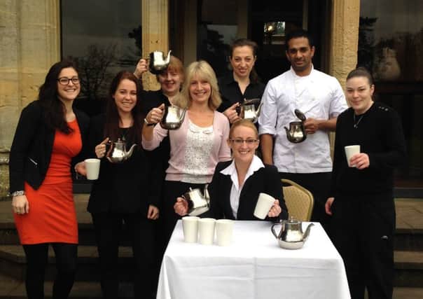 Vicky Marshall and her colleagues at Shendish Manor who are all backing her Tea Challenge PNL-160802-095517001
