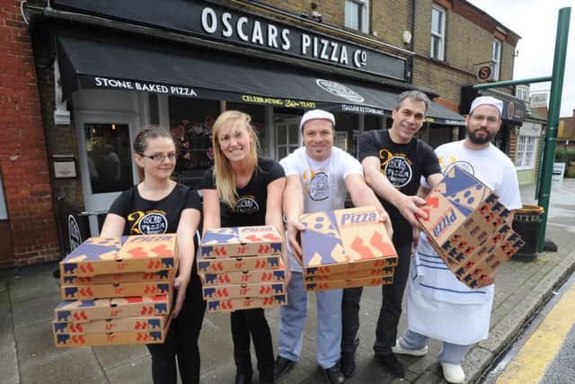 Oscars Pizza Company in Kings Langley is celebrating its 20th birthday. Some of the staff from left to right: Magda, Monike, Mani, Roberto and Jose