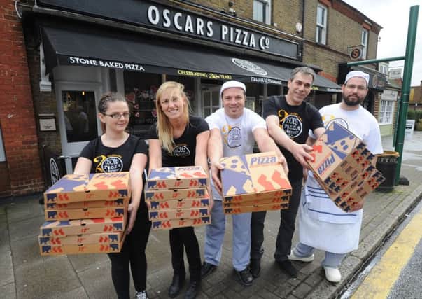 Oscars Pizza Company in Kings Langley is celebrating its 20th birthday. Some of the staff from left to right: Magda, Monike, Mani, Roberto and Jose