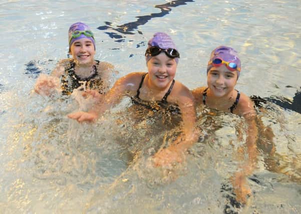 Swimmers from Tring Park School, from left, Katerina Jones, Alexandra Gibbon and Emily Loveday, all aged 11.