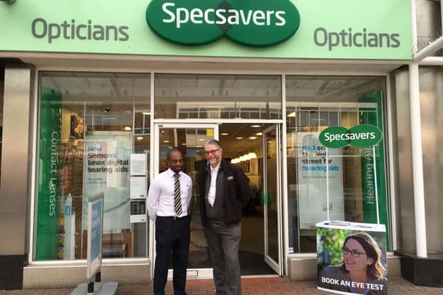 Gordon Dickens with Daniel Harris at Specsavers