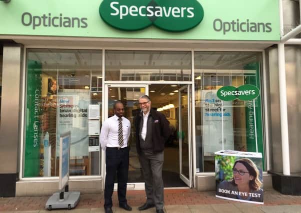 Gordon Dickens with Daniel Harris at Specsavers