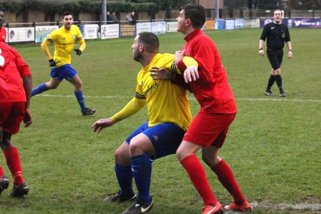 Bradley O'Donovan challenges for the ball. Picture (c) Ray Canham