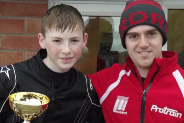 Luke Richardson with his mechanic Charlie Turner after winning his first race at Shenington race track