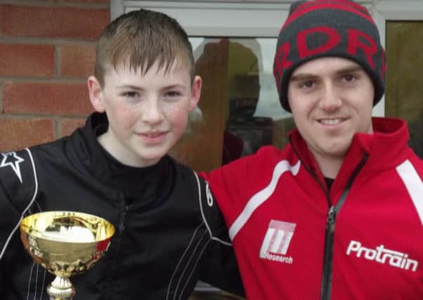 Luke Richardson with his mechanic Charlie Turner after winning his first race at Shenington race track