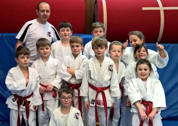 The Rush Judo red belt squad with coach Pete Brent