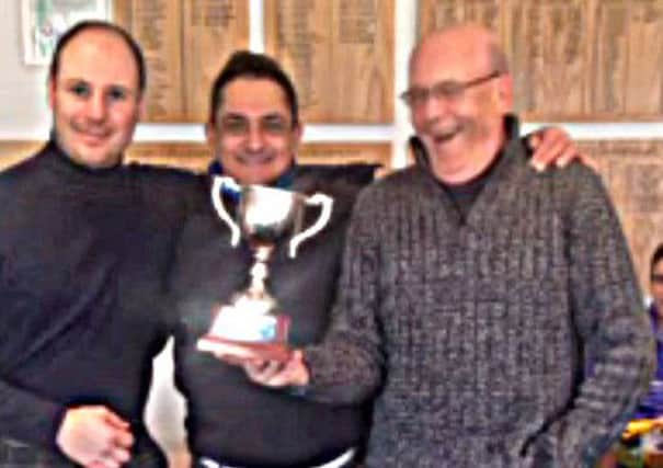Senior captain Paul Whiter presented the Little Hay Winter League trophy to Chris Thomas and Ricardo Romita