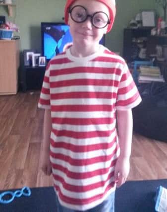 Aiden Levy, five, as Wally from the Where's Wally books. Sadly Aiden had to stay at home due to chickenpox, but mum Tracey said he still had fun PNL-160403-145032001
