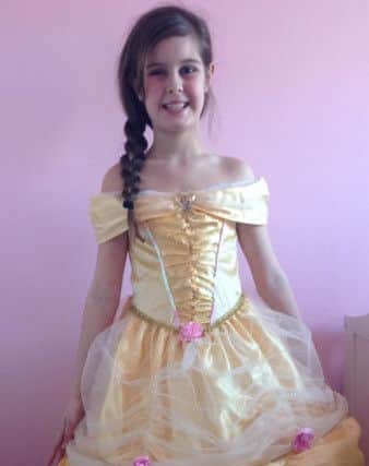 Madison Nolan, nine, as Belle from Beauty and the Beast PNL-160403-153421001