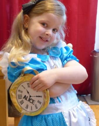 Hannah Farmery, five, as Alice in Wonderland PNL-160403-160629001