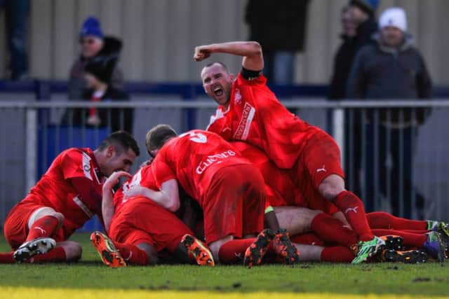The Hemel players celebrate Harry Hickford's late winner against Havant & Waterlooville. Picture (c) Terry Rickeard