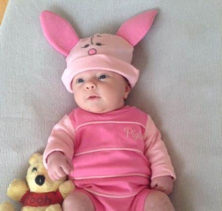 Anya Potter, five weeks, as Piglet from AA Milne's Winnie The Pooh books PNL-160703-094122001