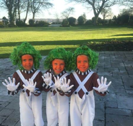 Twins Lilia and Layla Saad, four, and three-year-old sister Ava (centre) as Oompa Loompas from Charlie and the Chocolate Factory PNL-160403-151148001
