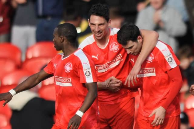 The Tudors celebrate Graeme Montgomery's opener. Picture (c) Terry Rickeard