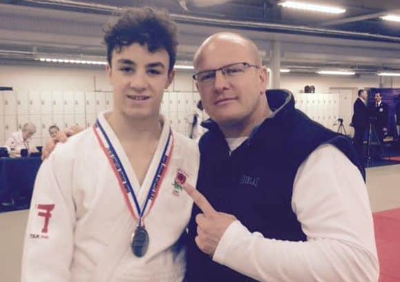 Michael Fryer with coach Laurie Rush
