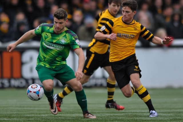 Michael Richens in action for the Tudors against Maidstone United. Picture (c) Terry Rickeard