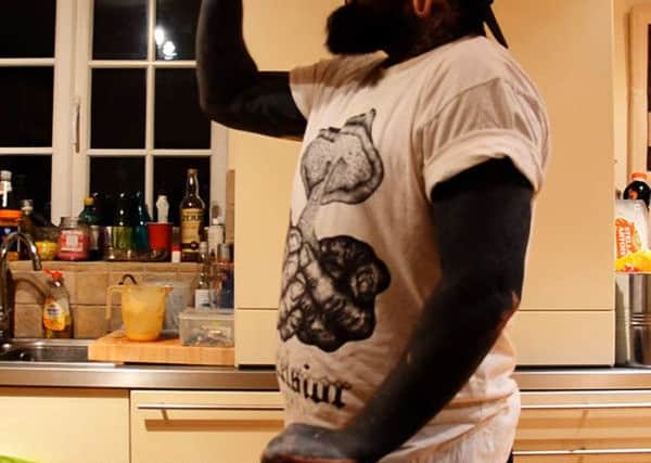 Andi Doherty downs a litre of neat Vodka - SWNS