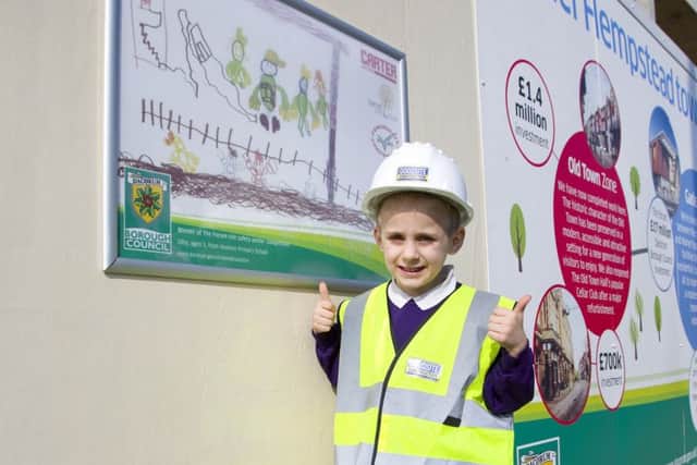 Oliver Sells with his winning poster