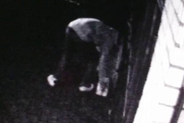 A CCTV image of a man police want to speak to in connection with milk thefts in Tring