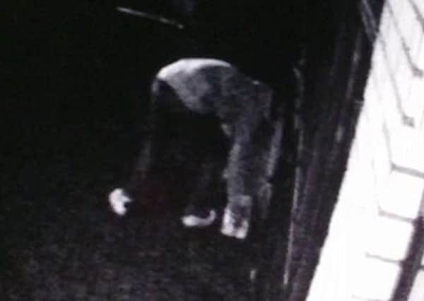 A CCTV image of a man police want to speak to in connection with milk thefts in Tring