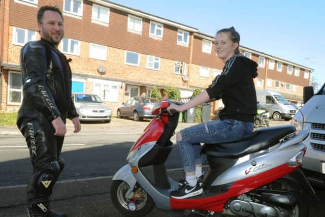 Molly Peters with Gareth Young after her scooter was repaired