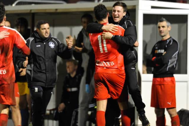 Hemel Town assistant boss Stuart Maynard congratulates goalscorer Adam Bailey-Dennis. Picture (c) Terry Rickeard