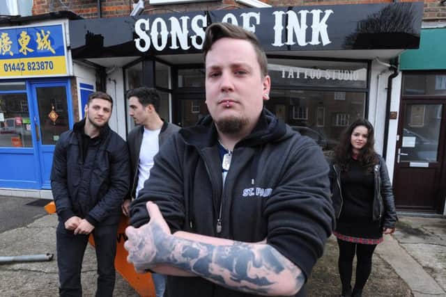 Brothers Martin, left, and Ben Fitzgerald with manager Duncan Lambert and apprentice Sophie Carwardine at Sons of Ink in Tring