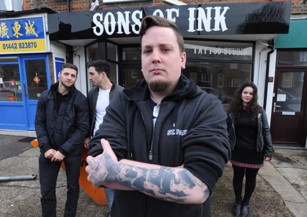 Brothers Martin, left, and Ben Fitzgerald with manager Duncan Lambert and apprentice Sophie Carwardine at Sons of Ink in Tring