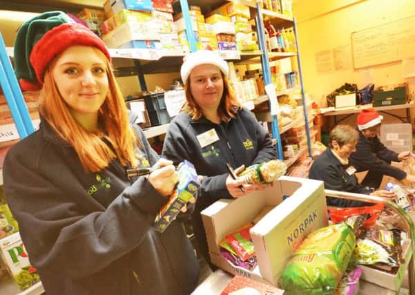 Gazette reporter Victoria Bull gets a taste of what the DENS Dacorum Foodbank offers as she volunteers at its busiest time of year. ENGPNL00120131216131837
