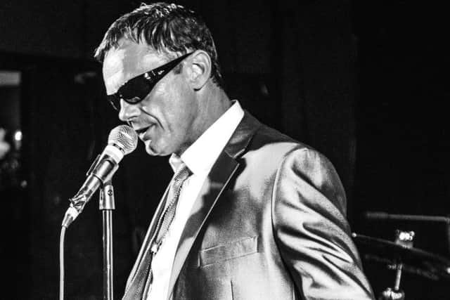 Special Kinda Madness vocalist Darren singing the songs of Suggs