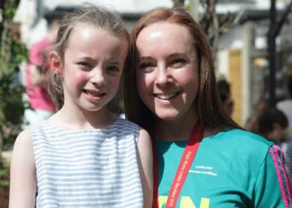 Shannon Foudy with daughter Catrin 
Pic: Virgin Money London Marathon
