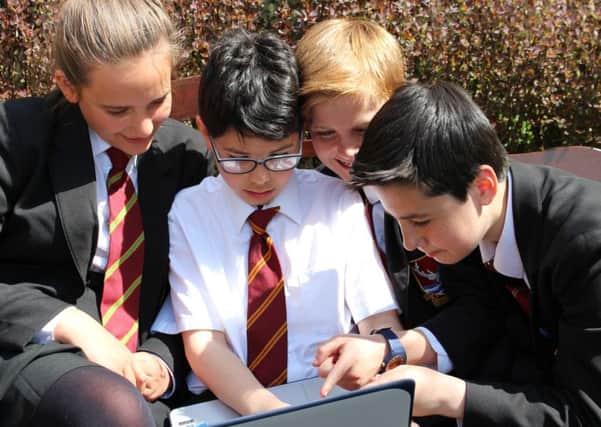 Tring School students with Chromebooks