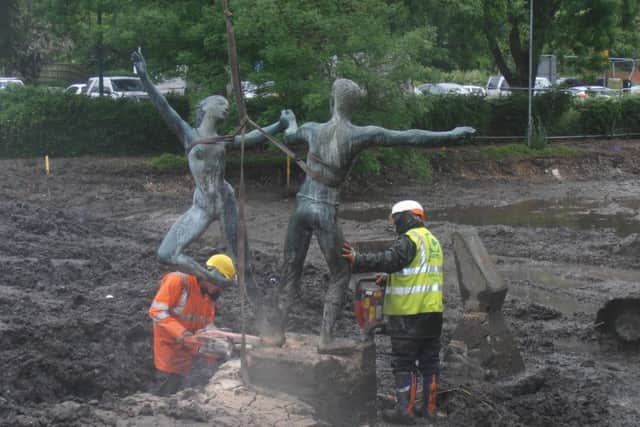 The Rock'n'Roll statue is removed for cleaning and refurbishing