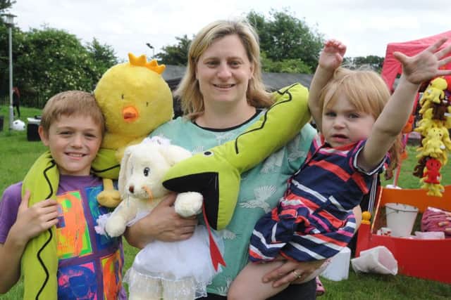Teddy Bear's Picnic at Chaulden Adventure Playground, Hemel Hempstead on Sunday. Deniece Colley and two of her children Marshall, 10, and Aurora, one.