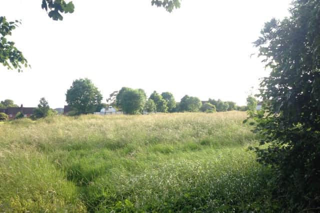The proposed site for eight new homes off Okeford Drive, Tring