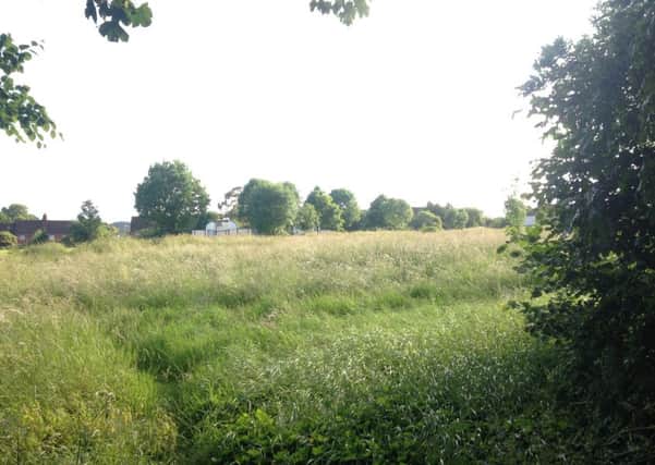 The proposed site for eight new homes off Okeford Drive, Tring