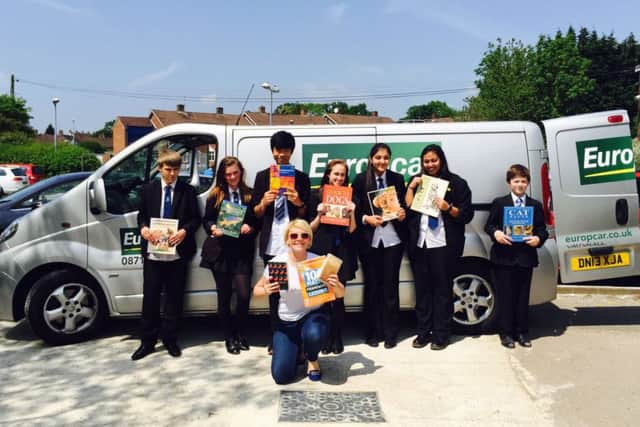 Longdean School students with books they are donating to The Musangu Foundation in Africa PNL-160622-150956001