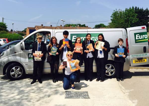 Longdean School students with books they are donating to The Musangu Foundation in Africa PNL-160622-150956001
