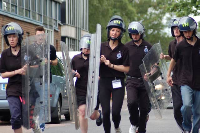 Dacorum police cadets demonstrate a shield run at the first county cadet competition. ENGPNL00120130207145823
