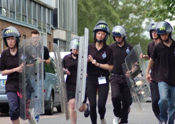 Dacorum police cadets demonstrate a shield run at the first county cadet competition. ENGPNL00120130207145823