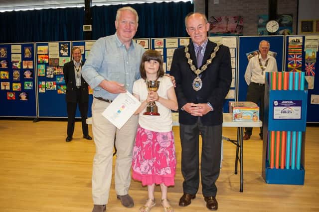 Winner Avril Thomas, centre, with Mike Penning MP and Berkhamsted mayor Tom Ritchie. Photo: Vanessa Champion PNL-160622-153637001