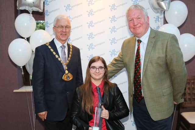 Jessica Stretton at the Dacorum Sports Awards in May, where she scooped the Rising Star award. She is pictured with Dacorum mayor Robert Mclean, left, and Hemel MP Mike Penning