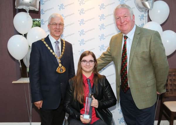 Jessica Stretton at the Dacorum Sports Awards in May, where she scooped the Rising Star award. She is pictured with Dacorum mayor Robert Mclean, left, and Hemel MP Mike Penning
