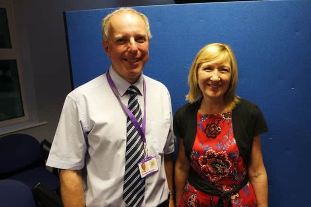 Helen Wignall with headteacher Richard Haynes