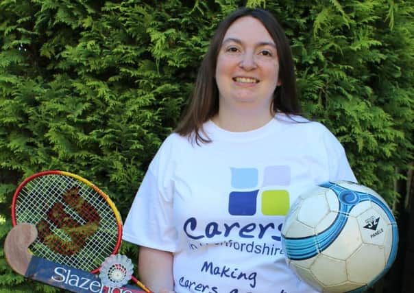 Clare Campbell, of Carers in Hertfordshire, gets ready for the young carers' sports sessions
