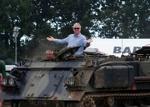 Mike Penning MP arrives in a tank to open the Dacorum Steam Fayre