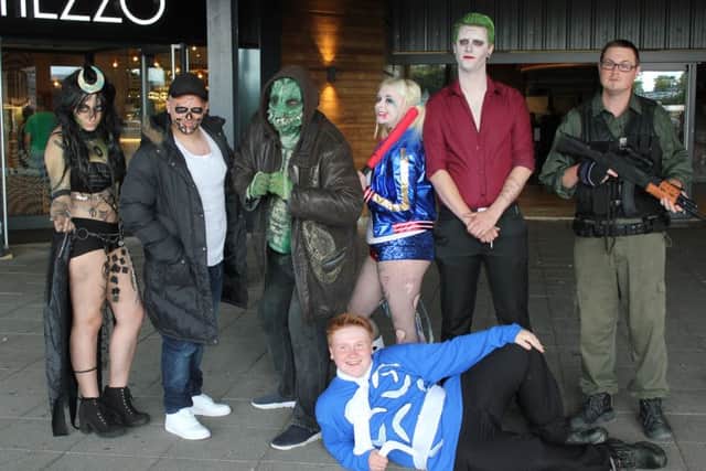 Cosplayers dress up for the Suicide Squad release at Hemel Hempstead's IMAX cinema on Friday, August 5. From left: Kit Horsley as Enchantress, Kurt Gooch as El Diablo, Damian Hammond as Killer Croc, Izzi Winters as Harley Quinn, Karl Brunton as the Joker, Luke Smith as Rick Flag and Shane Considine as Cpt Boomerang, front