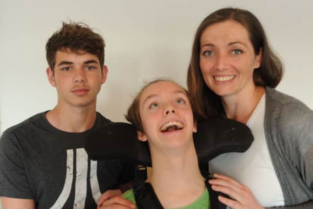 Bronwyn Evans, right, with her son Storm, 16, and daughter Chelsea, 13