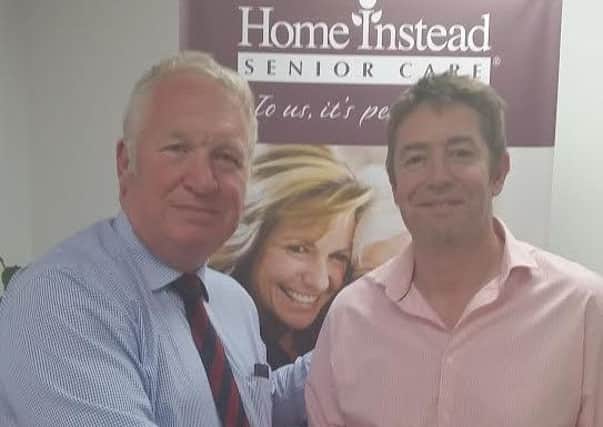 Mike Penning MP with Home Instead Senior Care owner Jeremy Lane